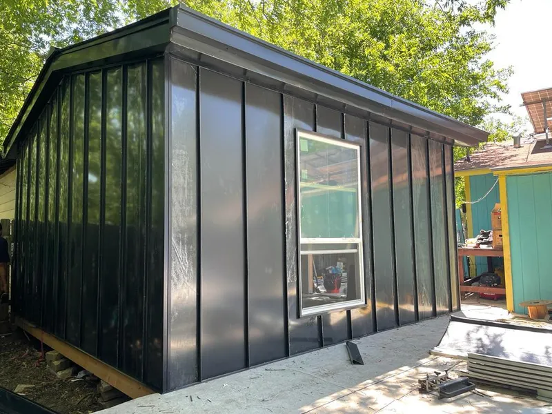 Black standing seam metal wall panels for Metal Roof Installation in Valparaiso