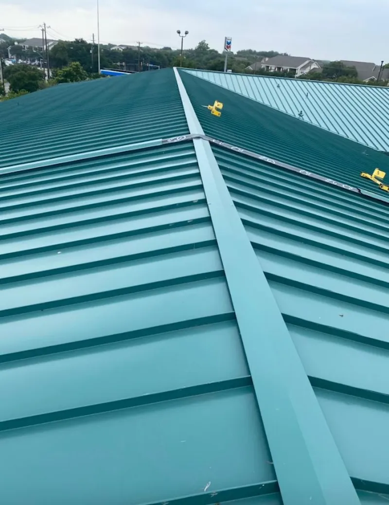 Green commercial metal roof ridge and valley for Metal Roof Repair in Valparaiso