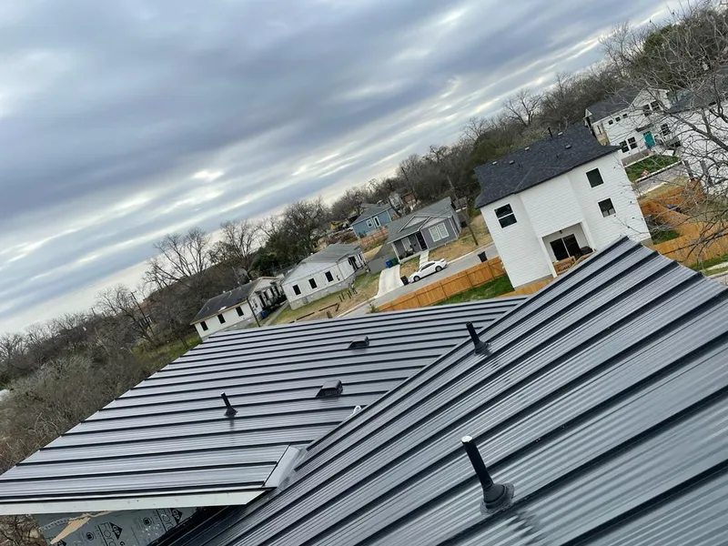 Standing seam metal roof panels with vents for Skylight Repair in Valparaiso